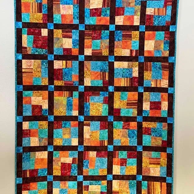 Sashed wonky nine patches