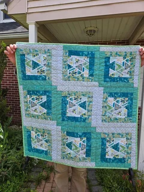 Log cabin baby quilt