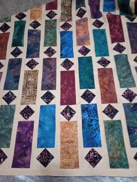 Jewel Tone Batik Lap Quilt