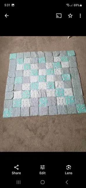 Adriannas Son Theos Baby Quilt